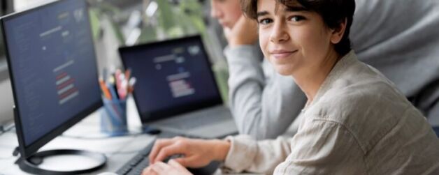 Schoolgirl-In-IT-Class-Using-Computer