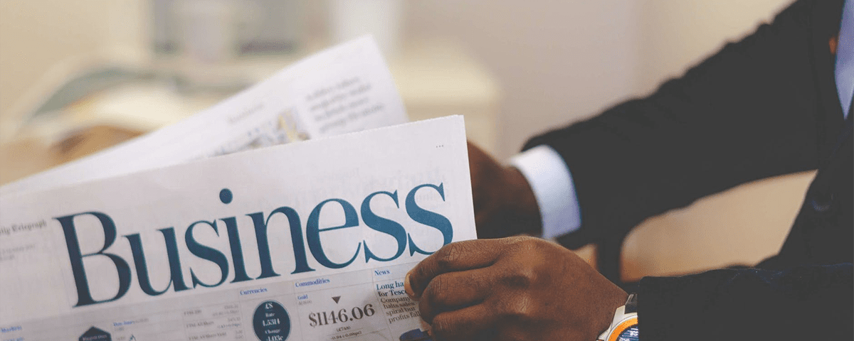 person reading a newspaper