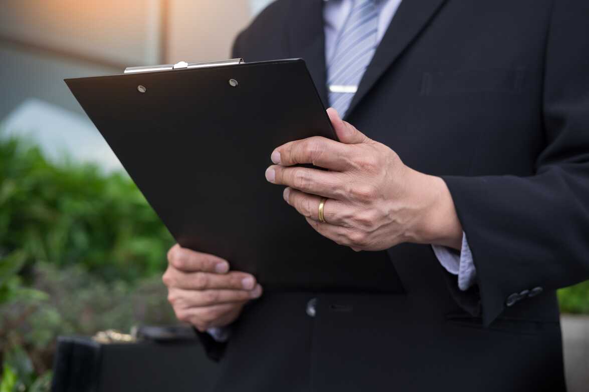 Lawyer pointing to legal documents